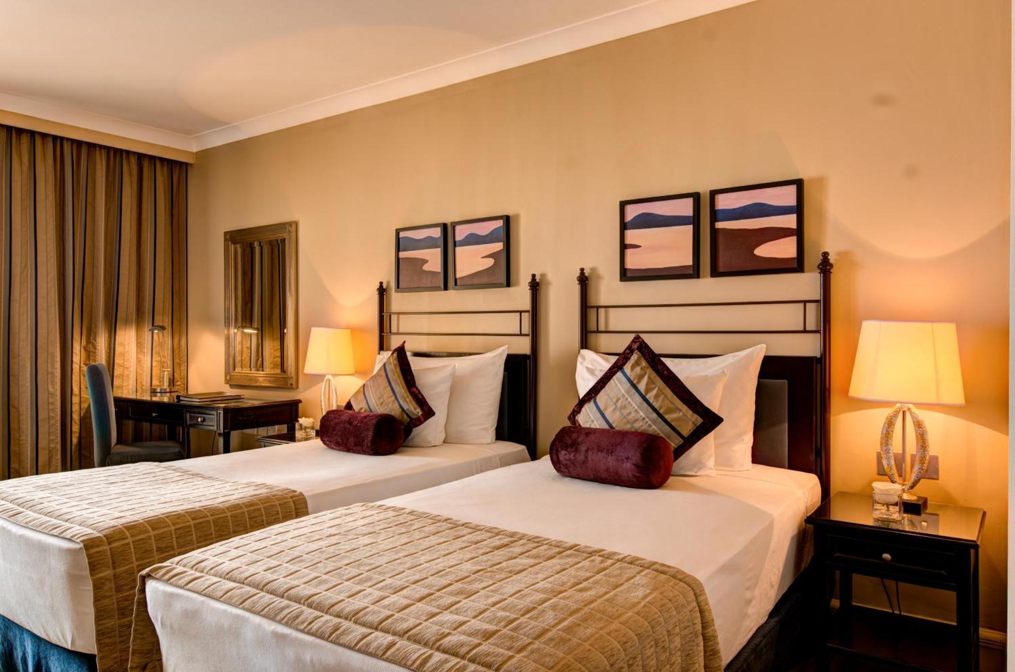 Отель Corinthia St George'S Bay Сент Джулианс Номер фото A room at the hotel