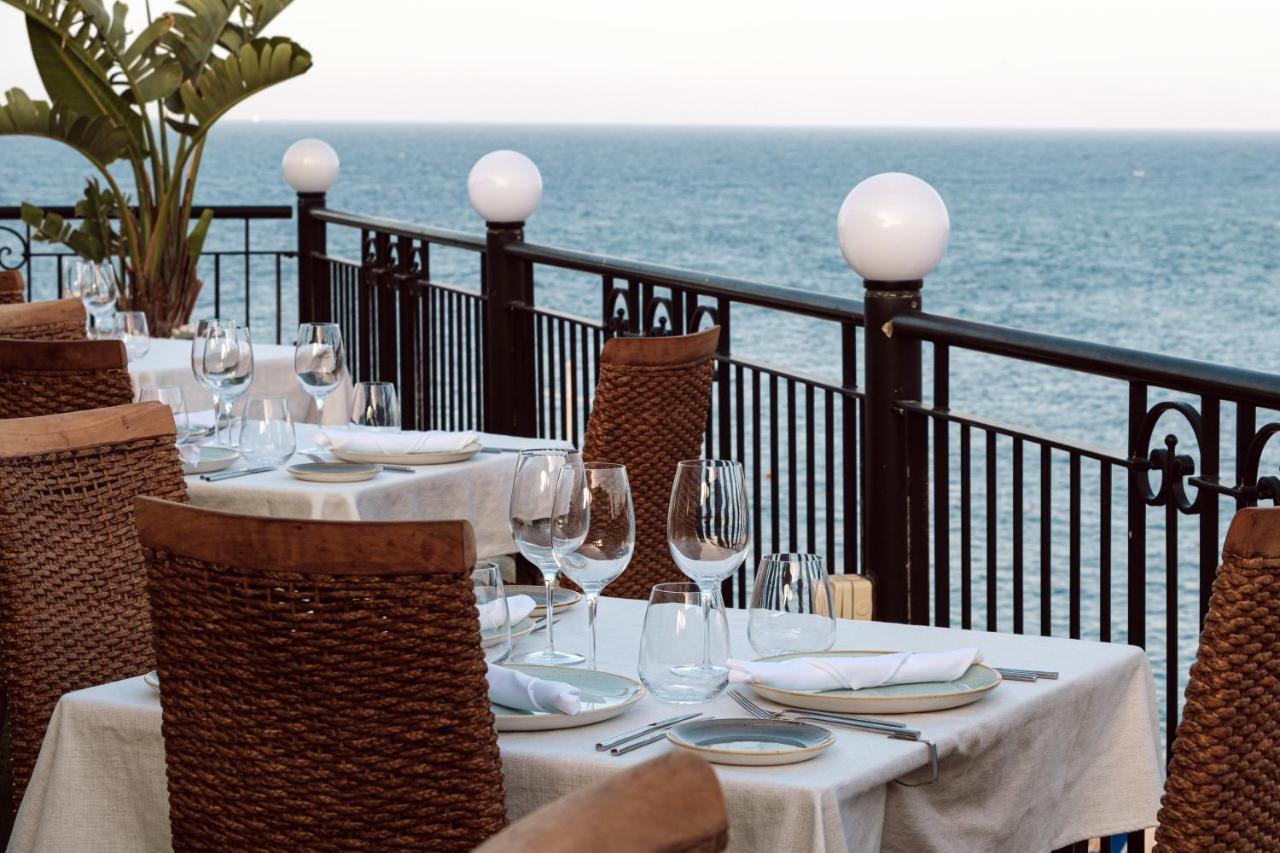 Отель Corinthia St George'S Bay Сент Джулианс Экстерьер фото The restaurant